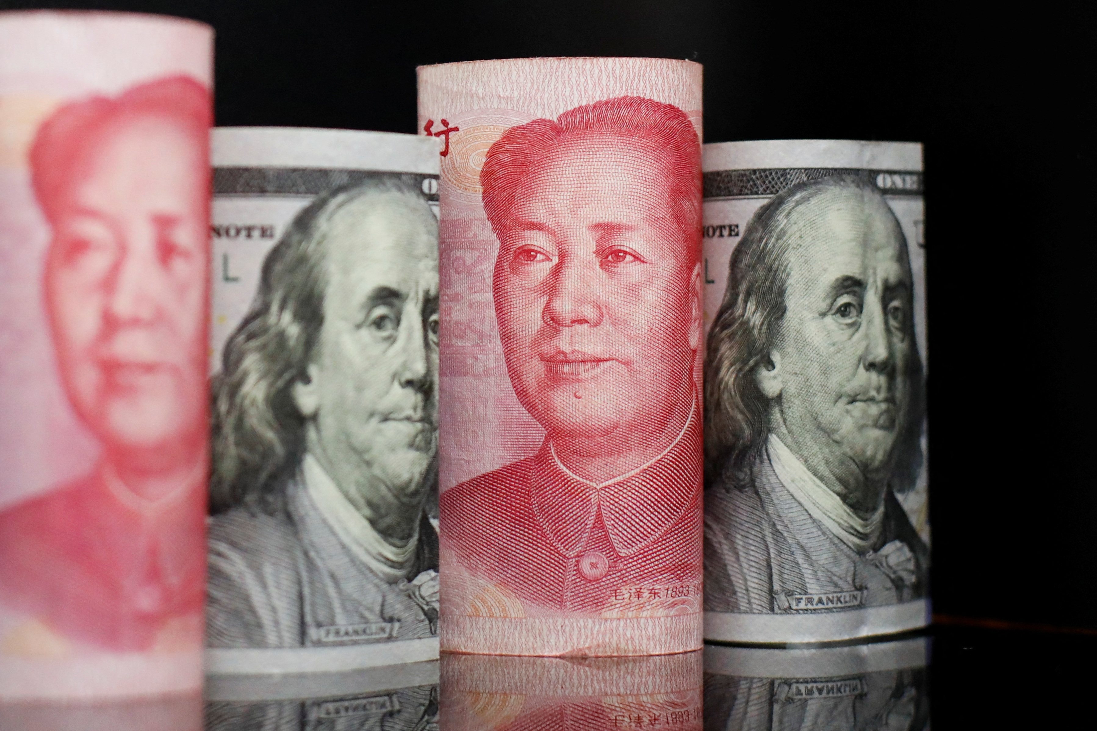 Dollar set for fifth winning week on Fed bets, PBOC supports yuan