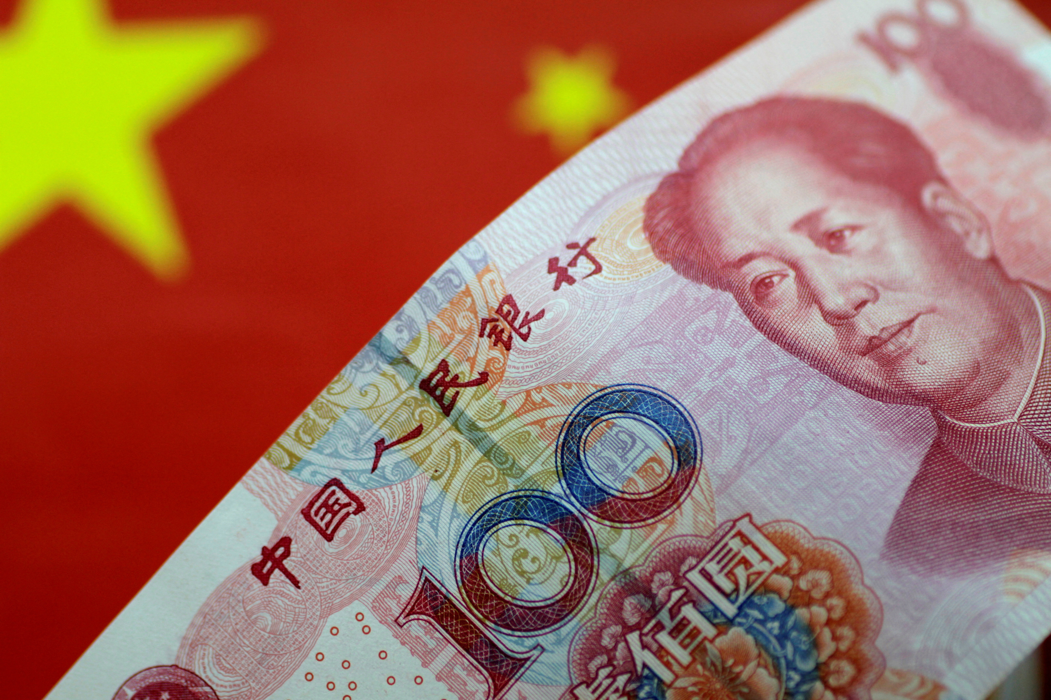 China's offshore yuan weakens after reserve requirement ratio cut