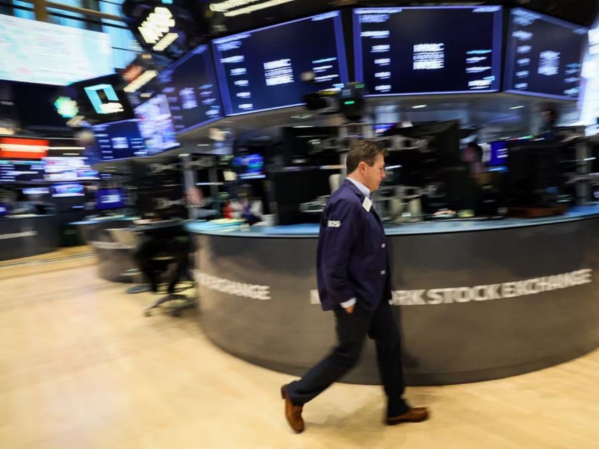 US market down as earnings roll in; investors assess economic data