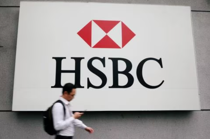 HSBC profit misses estimates on costs, to buy back $3 billion of shares