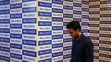 Reliance Communications ratings under review for downgrade despite Brookfield deal, Moody's; shares flat 