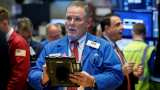 Global Markets: Wall Street falls on poor economic outlook; oil, gold slip