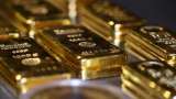 Gold flat as firmer dollar, yields offset Ukraine worries