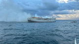 Ship carrying nearly 3,000 cars ablaze off Dutch coast, crew member dead