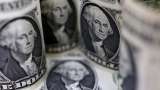 Dollar hits 4-week peak, then eases, sterling lower after BOE hike