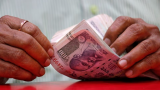 Rupee caught between further rise in US yields, yuan recovery