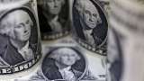 Dollar hovers near two-month high, yen near 146/dollar