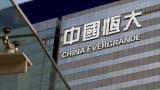 Evergrande shares sink after saying it is unable to issue new debt