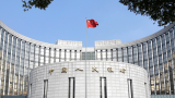 China's short-term money rates spike, markets expect more policy easing