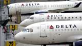 Delta lays off some corporate workers to cut costs