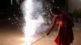 Smoky skies in Indian capital on Diwali as revellers defy firecracker ban