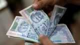 Rupee rises 32 paise to 83.01 against US dollar in early trade