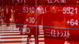 Japan shares hit three-decade high, yuan climbs