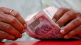 Rupee inches lower to end at 83.31 against dollar 