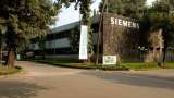 Siemens Q4 revenue grows 24%, board announces Rs 10/share dividend; should you buy, sell or hold shares?